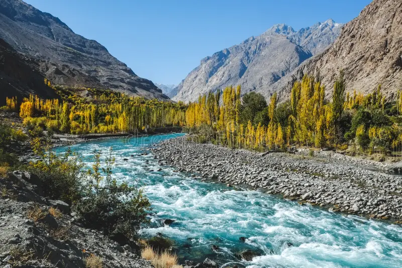 autumn-scene-blue-turquoise-water-gilgit-river-flowing-gupis-ghizer-gilgit-baltistan-pakistan-autumn-scene-blue-turqu-133978228